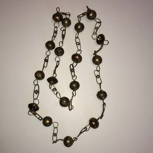 Unique necklace made of Mexican wedding beads.